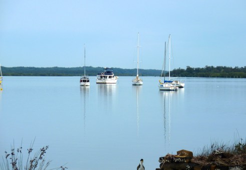 Blue skies, blue waters, and check out those mast reflections.