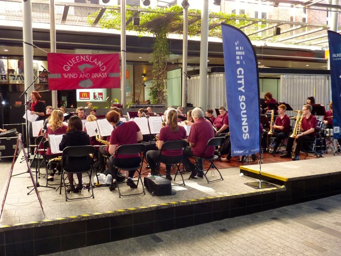 Orchestra playing in city centre.