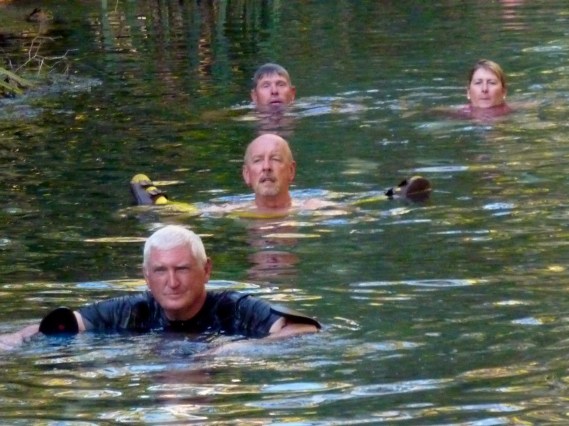 Here he comes - note the sandals hanging on the ends of the noodle.