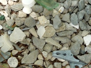 A clothes peg, and piece of broken glass carefully chosen to colour co-ordinate