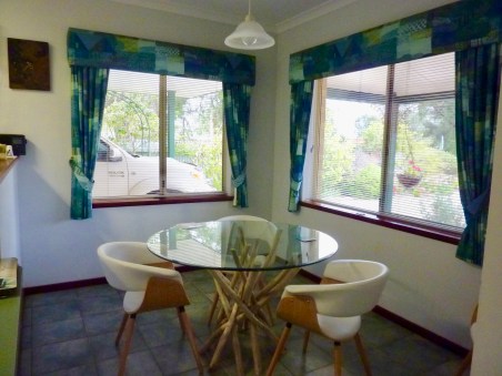 The dining room curtains are yet to be replaced. 