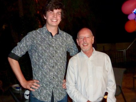 Pop with grandson 2 towering over him.