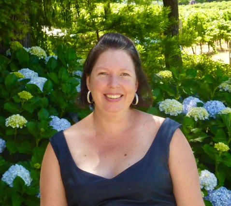 Alice looking stunning in a blue dress colour co-ordinated with the blue Hydrangea